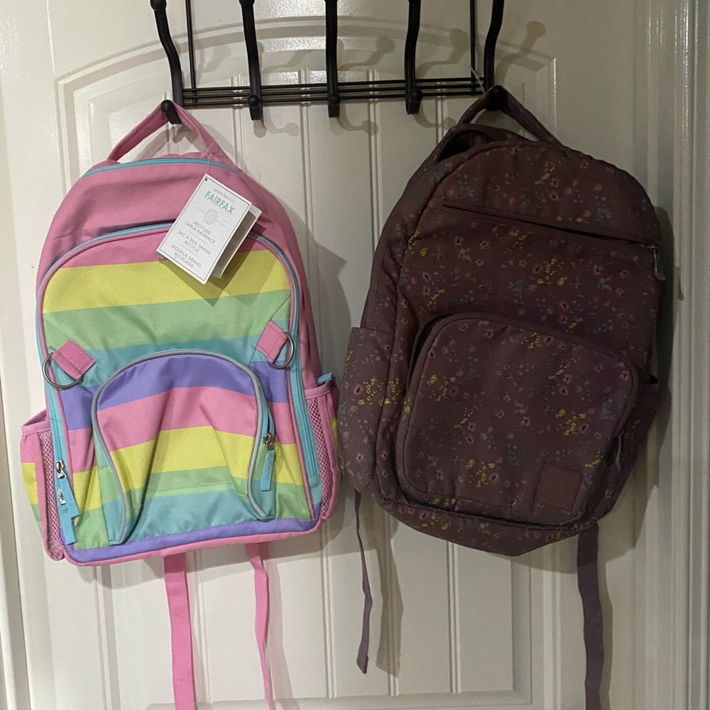 Two back packs. One NWT.